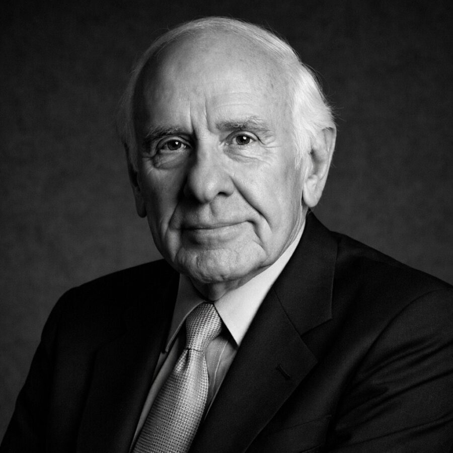 Ritratto in bianco e nero di Jim Rohn, autore e speaker motivazionale statunitense, noto per le sue frasi su disciplina, responsabilità personale e successo – Il Meglio dei Libri