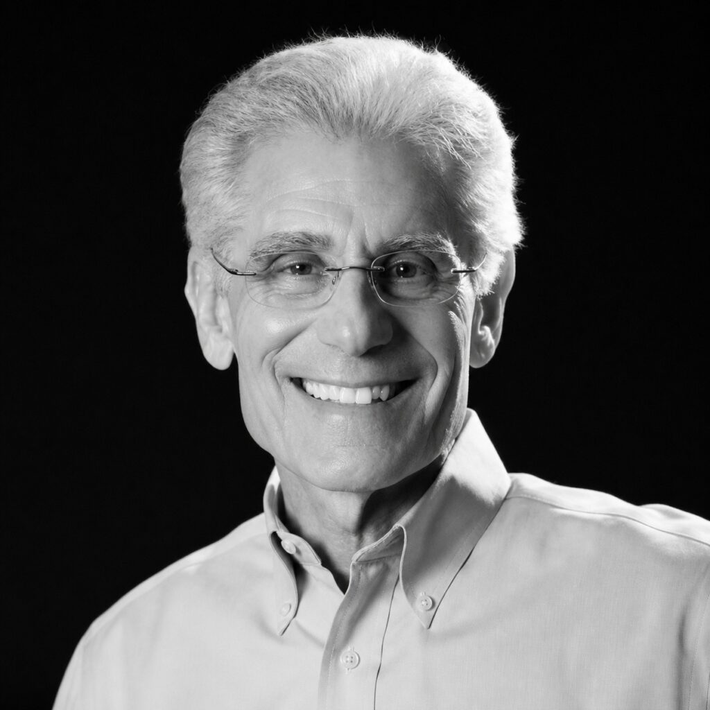 Ritratto di Brian L. Weiss, psichiatra e autore statunitense, noto per le sue frasi su regressione, guarigione interiore e crescita spirituale – Il Meglio dei Libri